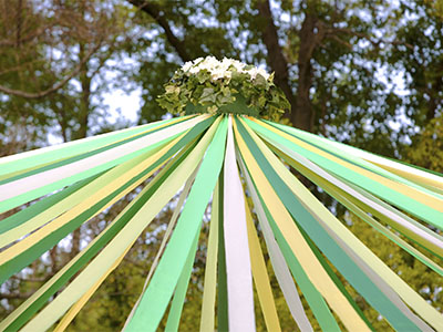 The top or upper half of a May pole used in celebration of May Day.